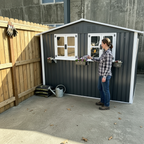 6x9 FT Outdoor Metal Storage Shed with Window & Flower Rack